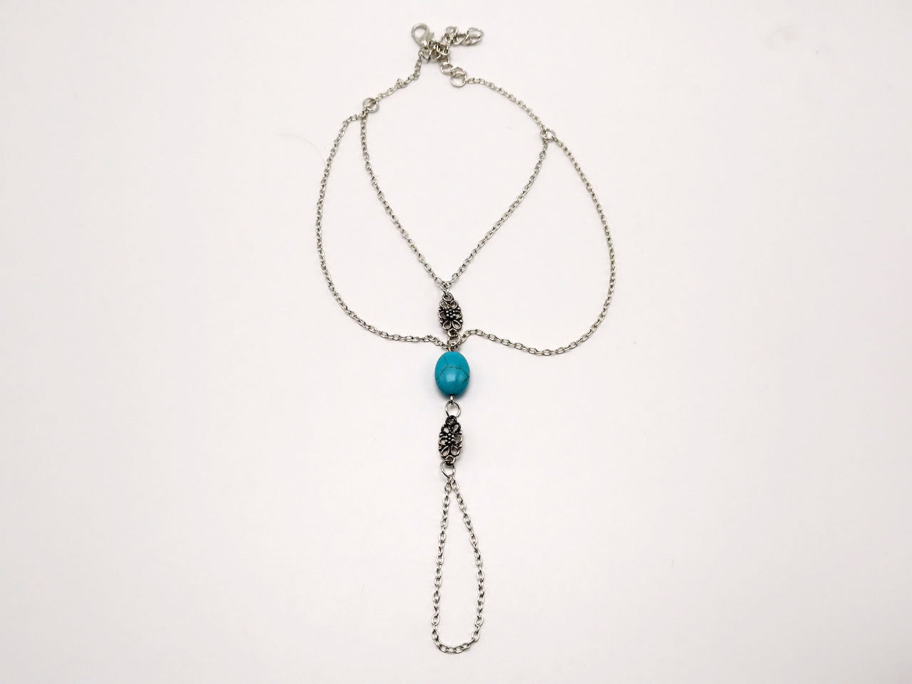 Hollow carved turquoise finger bracelet