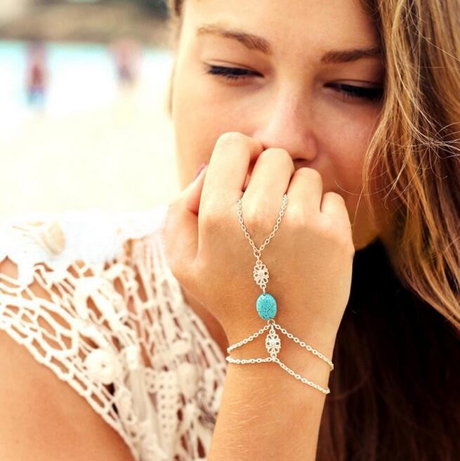 Hollow carved turquoise finger bracelet